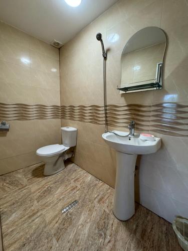 Ett badrum på Guesthouse SANIKO