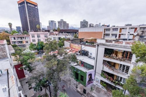 an overhead view of a city with tall buildings at San Carlos rentals - Lastarria in Santiago