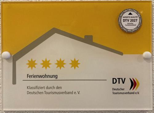 znak dla domu z dyridionictionictioniction calvd w obiekcie 4 Sterne Ferienwohnung Sorbitztal inklusive Gästekarte w mieście Rohrbach