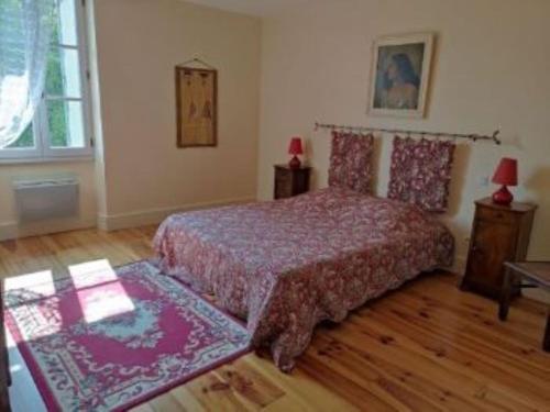 Postel nebo postele na pokoji v ubytování Gîte du Mandarin
