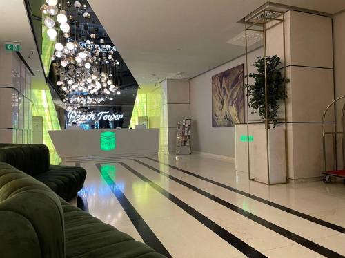 a lobby of a store with a glass floor at Real Beach Tower in Batumi