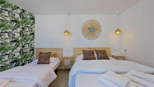 Postel nebo postele na pokoji v ubytování El Puerto de Fuengirola