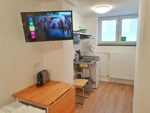 Η κουζίνα ή μικρή κουζίνα στο Aparthotel Sanni