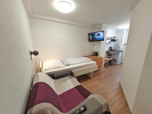 Ένα ή περισσότερα κρεβάτια σε δωμάτιο στο Aparthotel Sanni