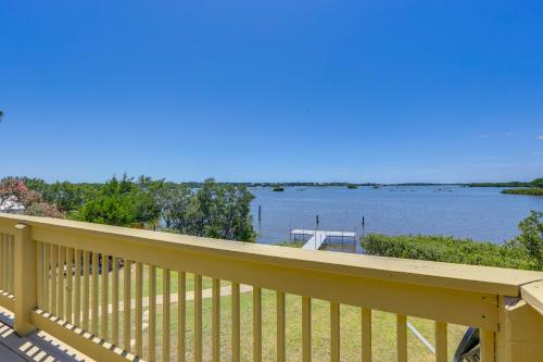 a balcony with a view of the water at Waterfront Cedar Key Duplex Home Grill and Dock! in Cedar Key