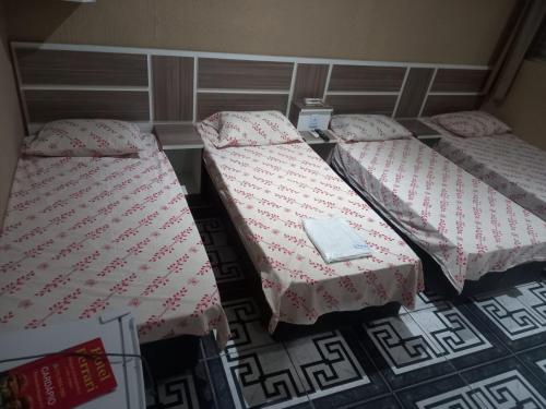 Ein Bett oder Betten in einem Zimmer der Unterkunft Hotel Ferrari
