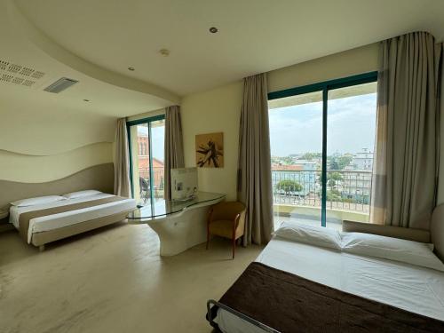 Ένα ή περισσότερα κρεβάτια σε δωμάτιο στο Bellariva Feeling Hotel