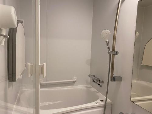 a bathroom with a shower and a tub and a toilet at Kyoto - Hotel - Vacation STAY 84994v in Kyoto