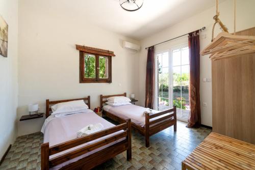 Posteľ alebo postele v izbe v ubytovaní Lake House