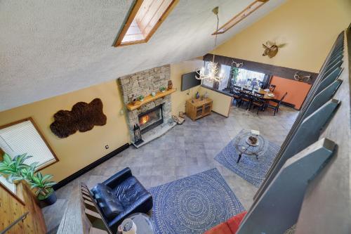 an overhead view of a living room with a fireplace at Chalet renovated Near Casino, Camelback , Kalahari 4bdrms firepit hot tub game room in Tobyhanna