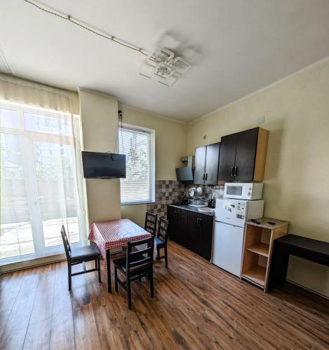 Кухня или мини-кухня в Apartment on the sea
