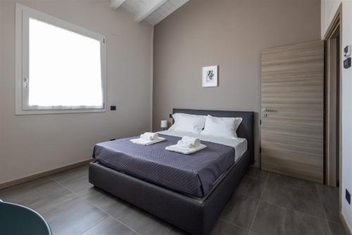 Postel nebo postele na pokoji v ubytování IseoLakeRental - Soleaura
