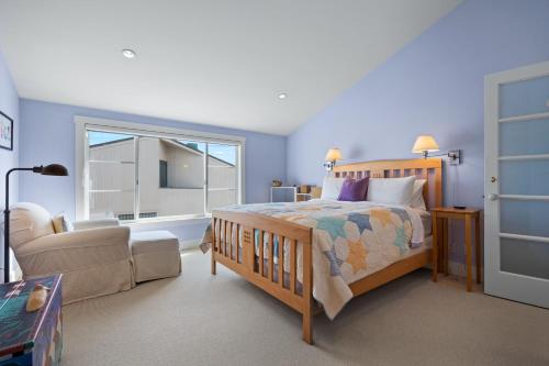 Una cama o camas en una habitación de Sand Side Bliss