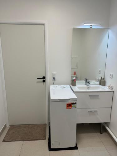 Photo de la galerie de l'établissement Appartement 2 pièces neuf avec sont jardin privé, à Franconville