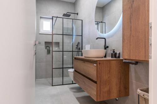 Ένα μπάνιο στο Apartments Angelo