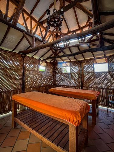 a bedroom with a bed in a yurt at Hotel Campestre Ataraxia Barichara in Barichara
