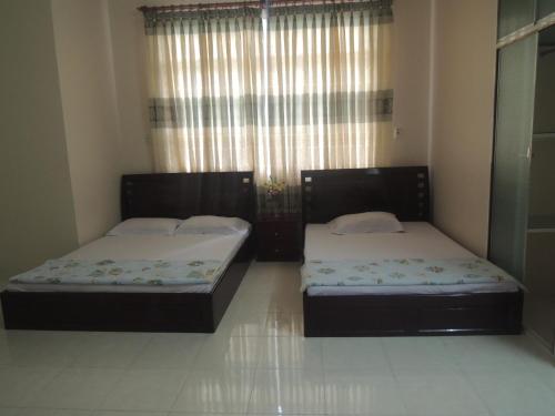 Katil atau katil-katil dalam bilik di Thanh Cong Hotel