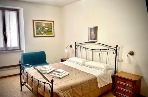 En eller flere senge i et værelse på Casa Gentile