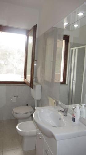Ванная комната в Casa Gisella Villasimius