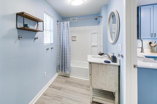 a bathroom with a sink and a shower at Waterfront Lake Hamilton Vacation Rental with Dock! in Royal