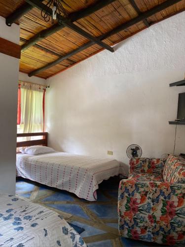Postel nebo postele na pokoji v ubytování Finca hotel tierra grata