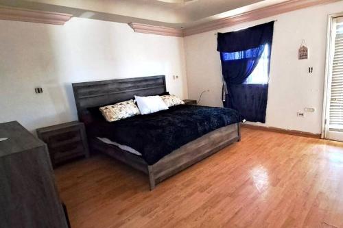 Katil atau katil-katil dalam bilik di Casa en Mexicali