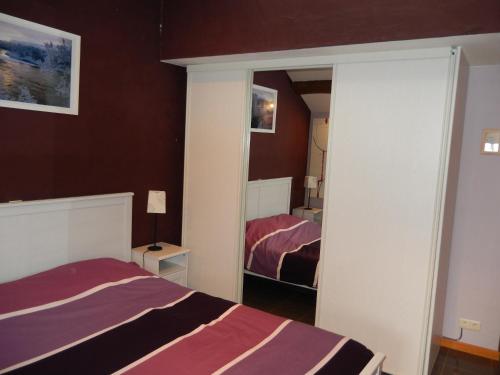 Voodi või voodid majutusasutuse B&B Le 'Ti 'Bou de Refuge toas