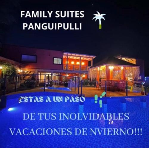 a picture of a swimming pool at night at Hotel Boutique Family Suites in Panguipulli