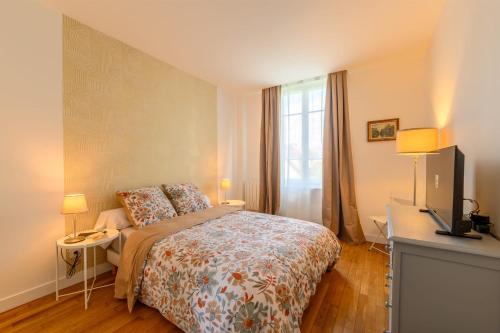 Katil atau katil-katil dalam bilik di Luxueux appartement d'Alfortville