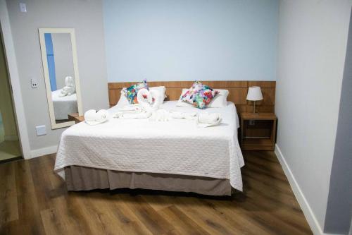 Ένα ή περισσότερα κρεβάτια σε δωμάτιο στο Athos Hotel