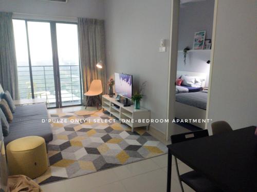 a room with a bedroom with a bed and a mirror at Tamarind Suites or D'Pulze Residence or Domain NeoCyber, click Room selection for location and pics in Cyberjaya