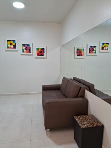 Ein Sitzbereich in der Unterkunft Excelente Apto no Smiles Cidade Nova