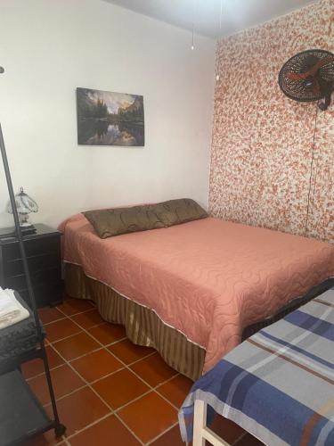 Giường trong phòng chung tại La Casa de Luzma