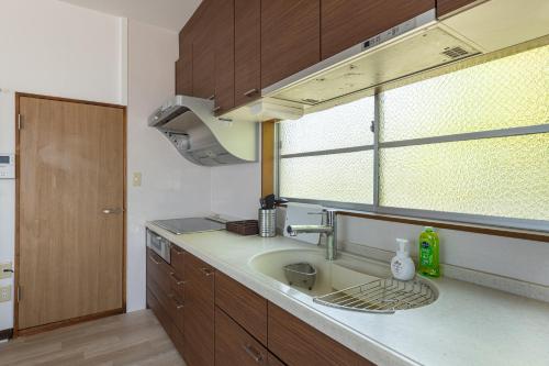 Køkken eller tekøkken på Villa Katsushikaお花茶屋駅徒歩10分