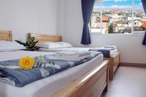 Postel nebo postele na pokoji v ubytování Hotel Nguyen Anh 2