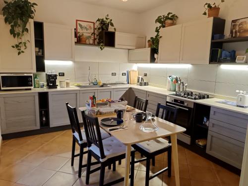 Kuchyň nebo kuchyňský kout v ubytování B&B Monte Adone