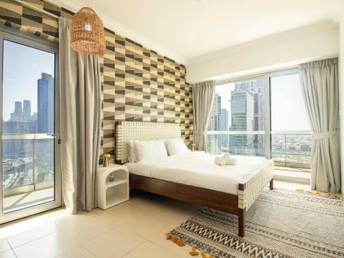 Posteľ alebo postele v izbe v ubytovaní Downtown Chic Easy walk to Dubai Mall & Fountain