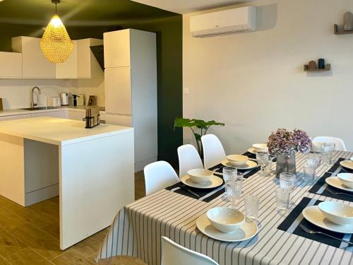 Η κουζίνα ή μικρή κουζίνα στο Vue Océan - Au Coeur de Contis Plage