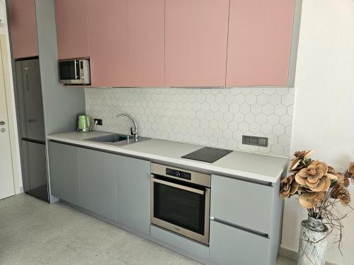 Dapur atau dapur kecil di Serenade apartment
