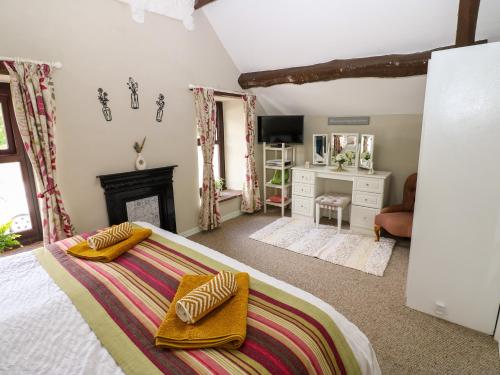 Postel nebo postele na pokoji v ubytování River Cottage