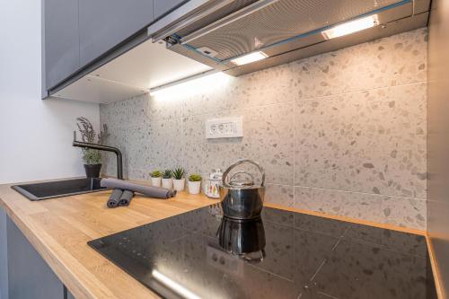 Kuchyňa alebo kuchynka v ubytovaní Sapore Di Mare Apartments