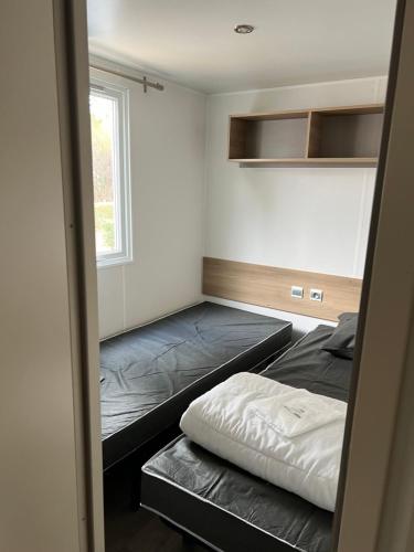 Postel nebo postele na pokoji v ubytování Mobilhome La Carabasse Vias Plage