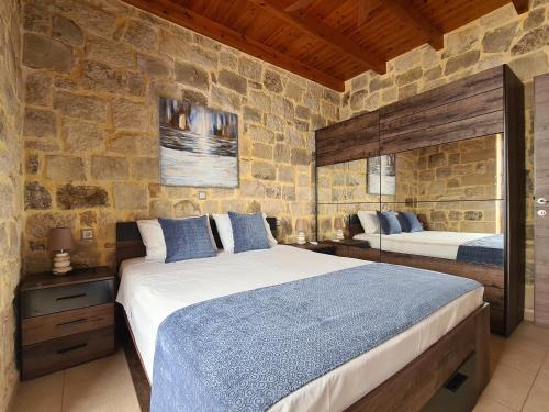 Ліжко або ліжка в номері New Villa Kalimera, view to Falasarna beach