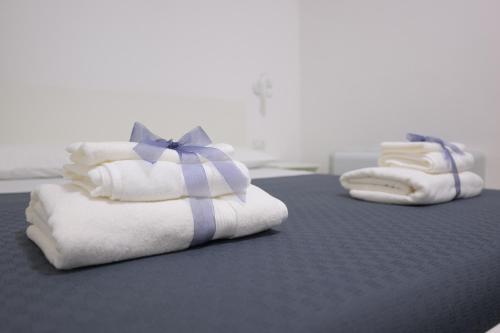 Postel nebo postele na pokoji v ubytování Rosa Barocca