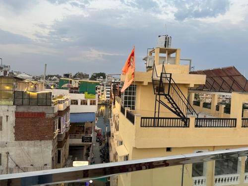a building with a flag on top of it at Hostel Funky Bunky in Udaipur