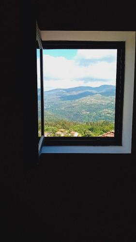 a window in a room with a view at Chalet do Soajo in Arcos de Valdevez