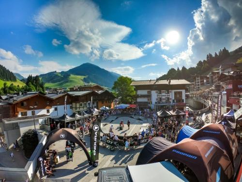 a view of a ski resort with a crowd of people at Hotel Pinzgauerhof - Inclusive Evening Dinner in Saalbach Hinterglemm