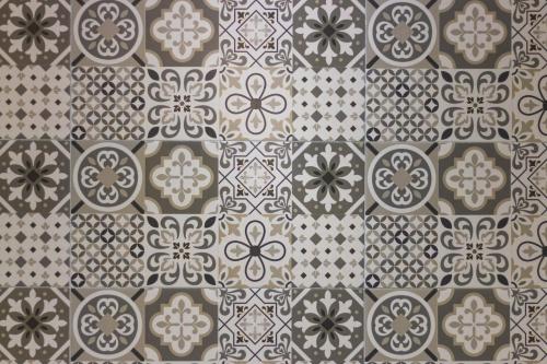 an image of a repeating pattern of tiles at Appartements Calmes et Spacieux in Tetouan