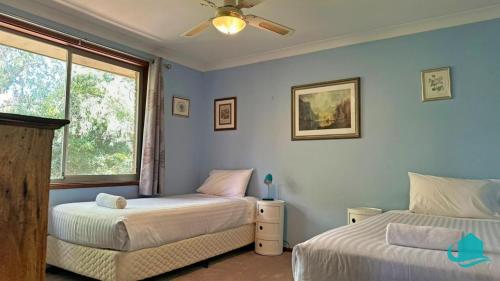 Katil atau katil-katil dalam bilik di Wemberley Lakehouse