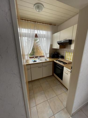 Kuchyň nebo kuchyňský kout v ubytování In't Noord